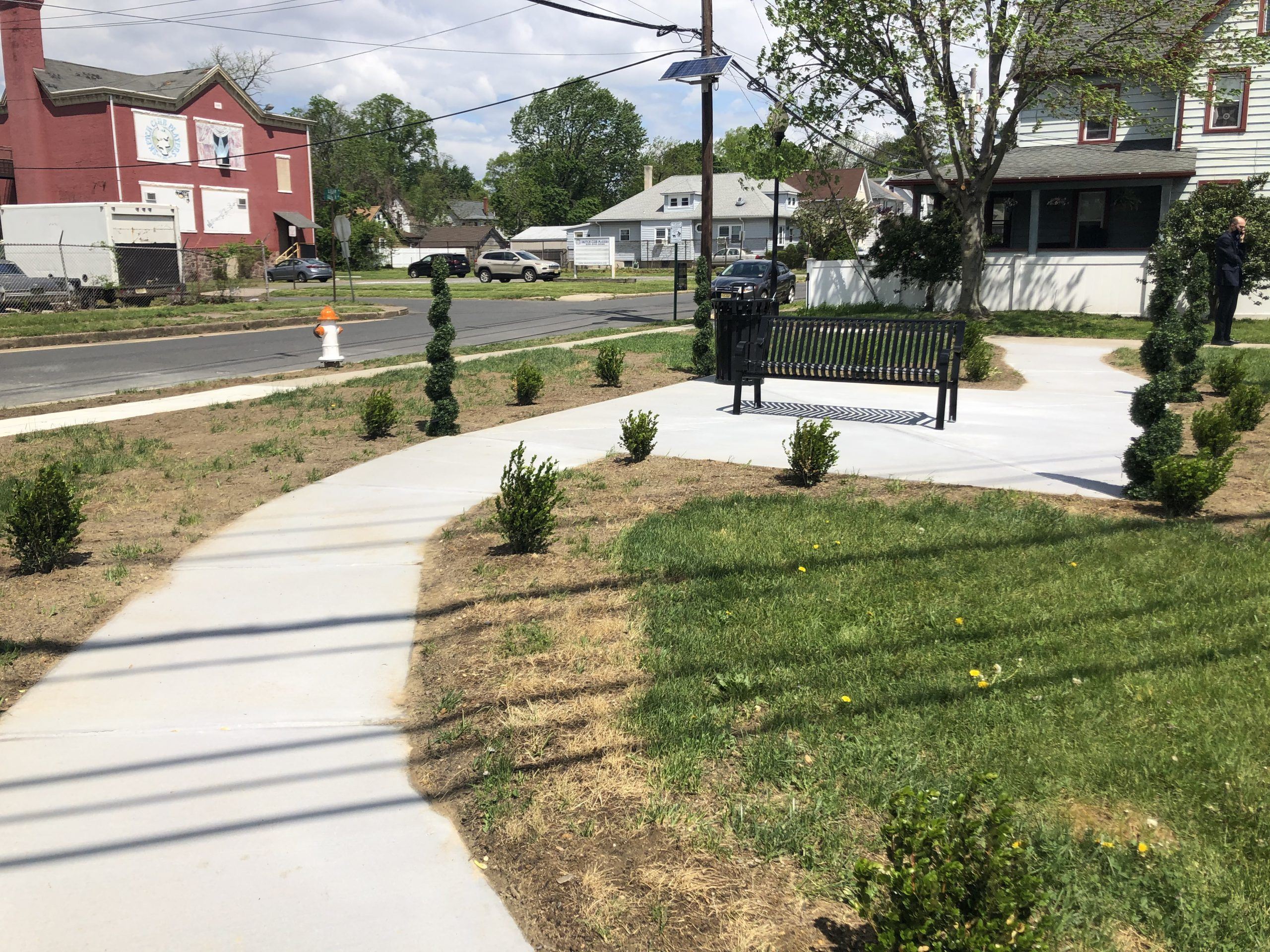 Park Bench Beside the Sidewalk